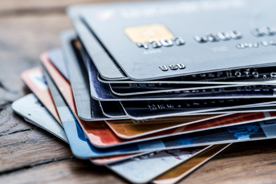 stack of credit cards to discuss in the best credit card forums