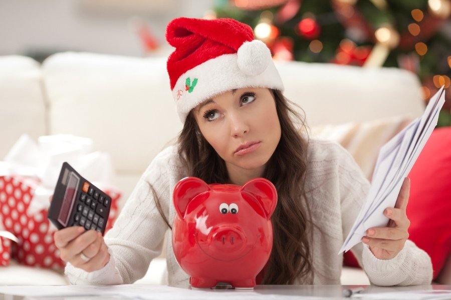 woman holiday planning to save money