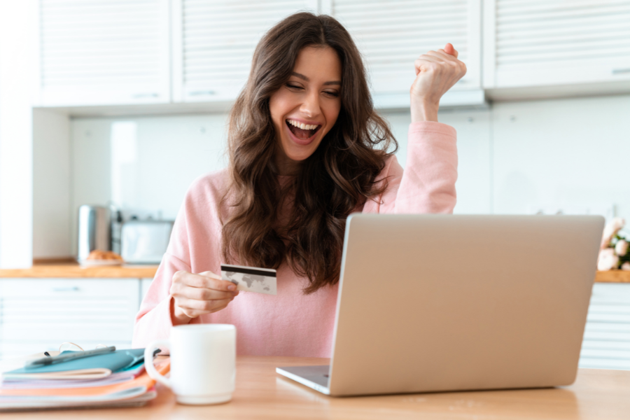 woman excited about using her credit card
