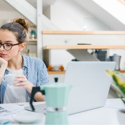 woman looking over the types of savings accounts she needs