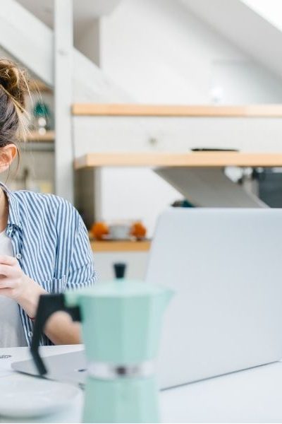 woman looking over the types of savings accounts she needs