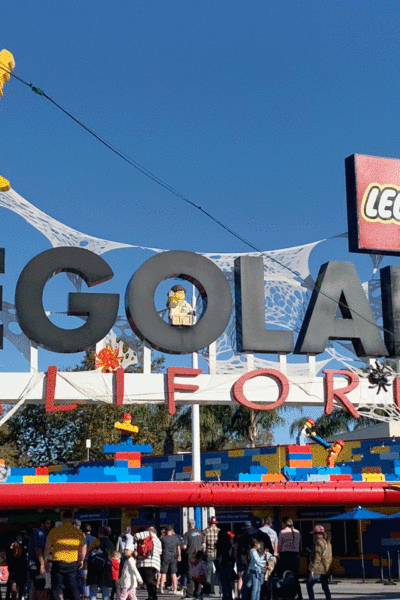 Legoland California Entrance is inviting and festive with spiderwebs for Halloween. Perfect place for a family getaway.