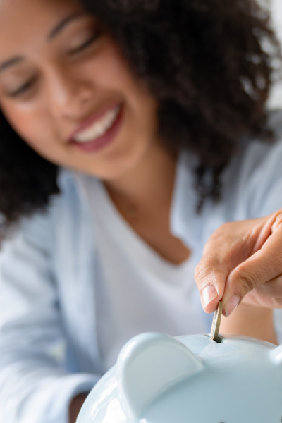 woman saving more with saving money challenges